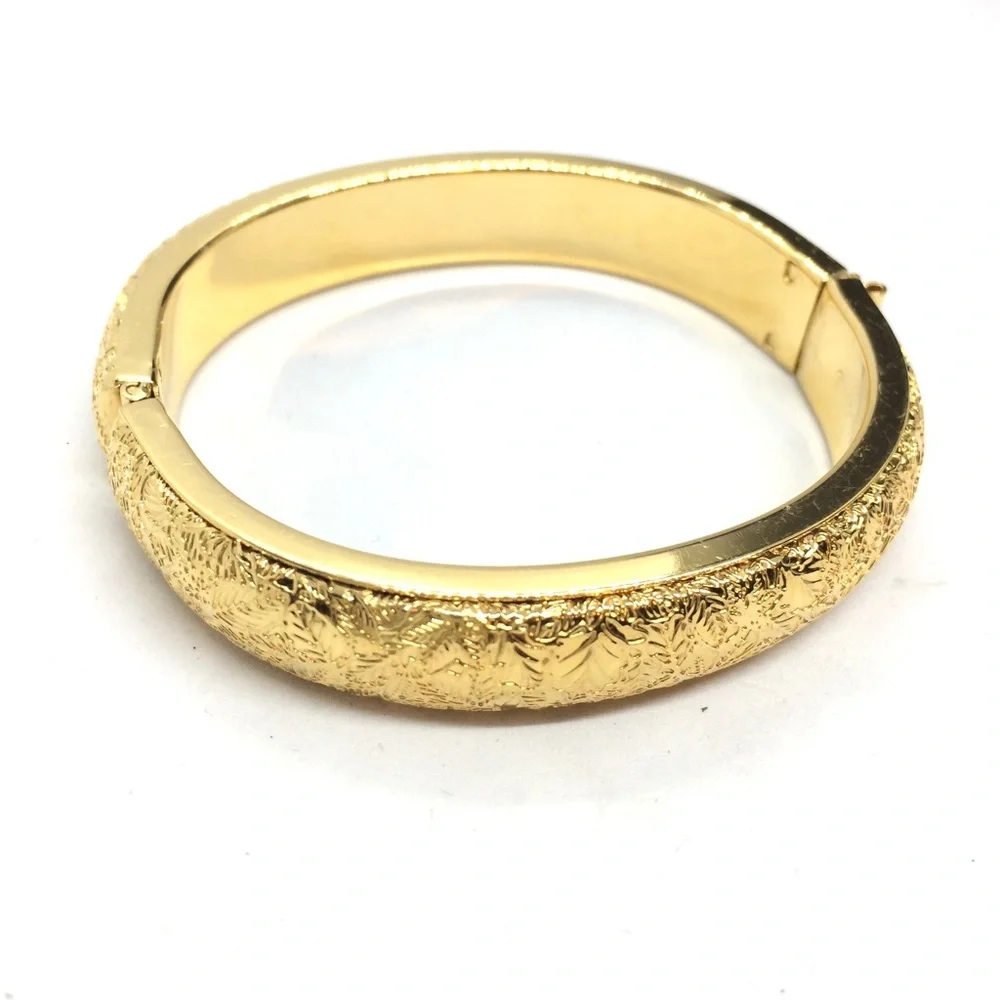 VINTAGE MONET BANGLE BRACELET ETCHED GOLD TONE CLAMPER HINGE